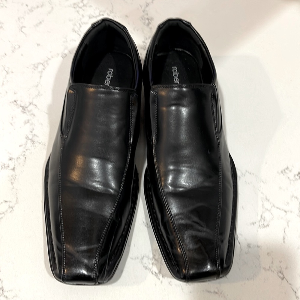Men slip on dress shoes